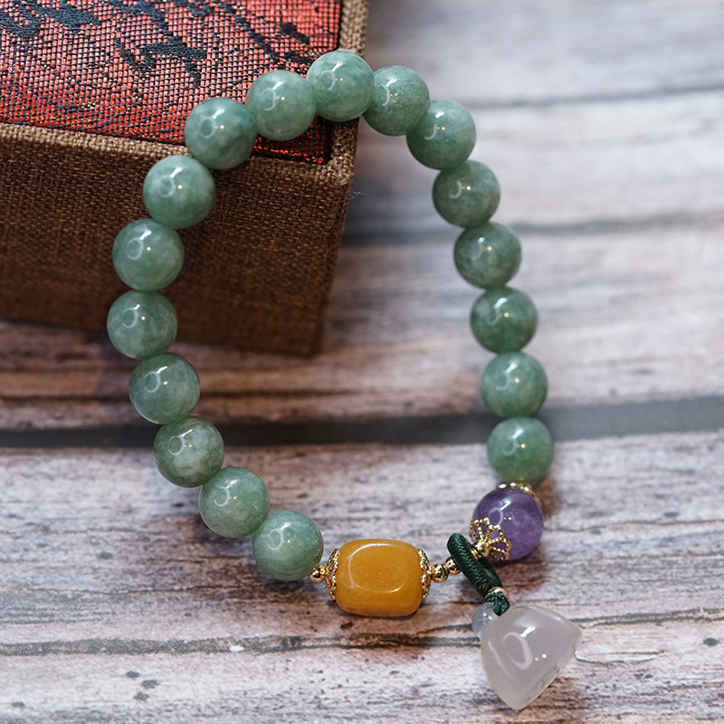 La nueva pulsera de calabaza de calcedonia, pulsera de peridoto étnico de estilo chino retro para mujer, pulsera de jade de seda dorada simple, un loto de jade birmano