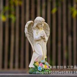 跨境花园太阳能天使摆件树脂工艺品雕像雕塑天使抱鸽子桌面装饰品
