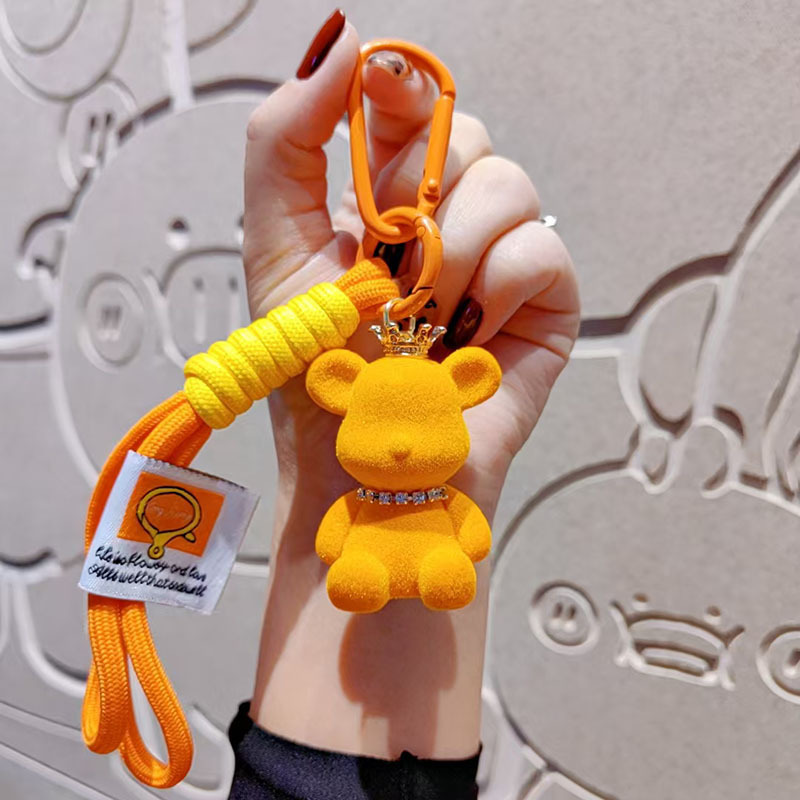 Nuevo cartón de dibujos animados flocado corona violenta oso llavero colgante pareja muñeca bolso colgante teléfono móvil pequeño regalo