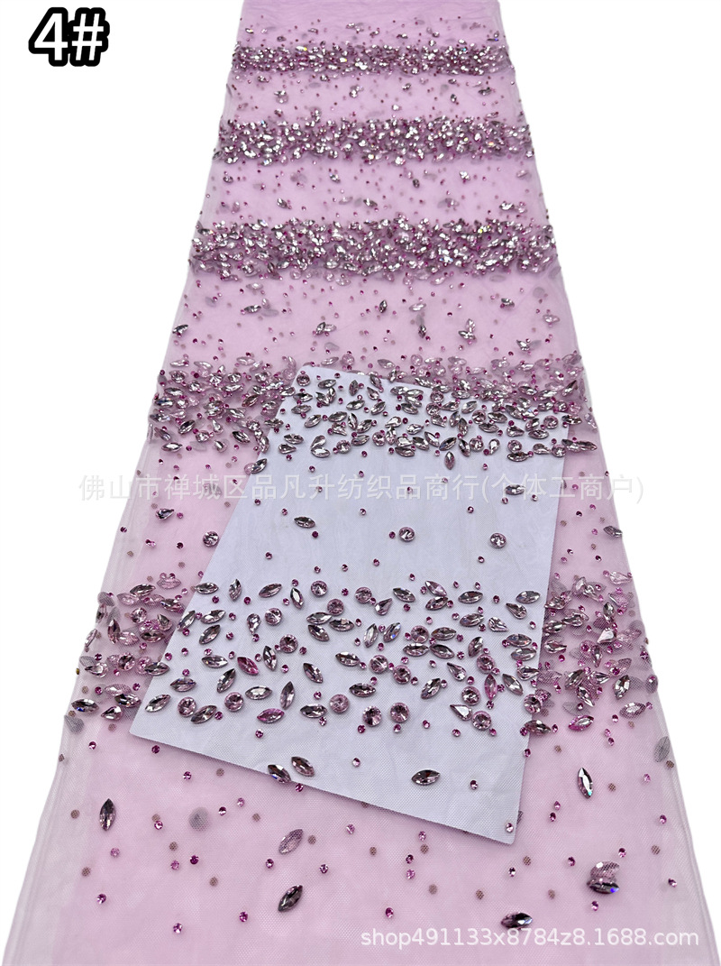 Tejido de malla de diamante de gota de agua laminada mano pesada clavos taladro de cola de pescado vestido de noche tela de boda en stock