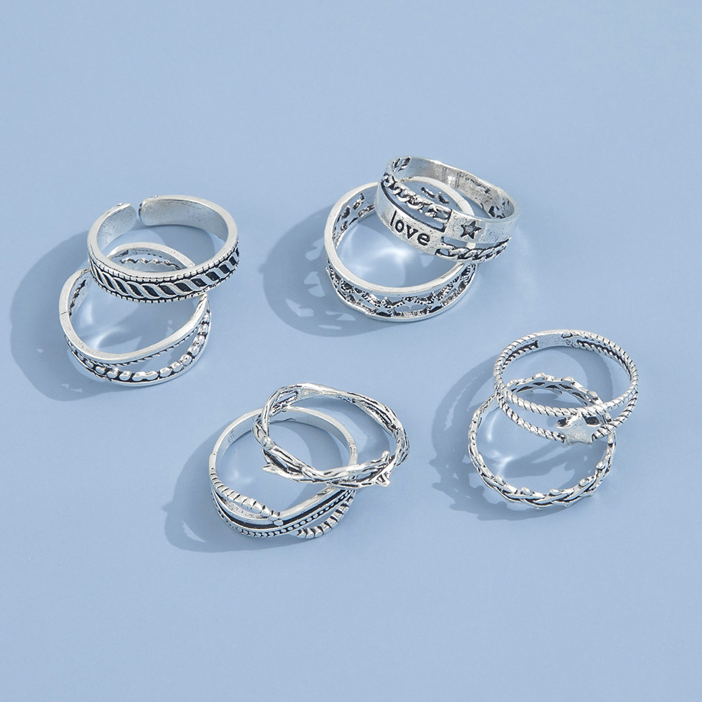 Punk Style Hollow Five-pointed Star Ring English Letters Thorns Retro Ornaments Eight-piece Set display picture 7
