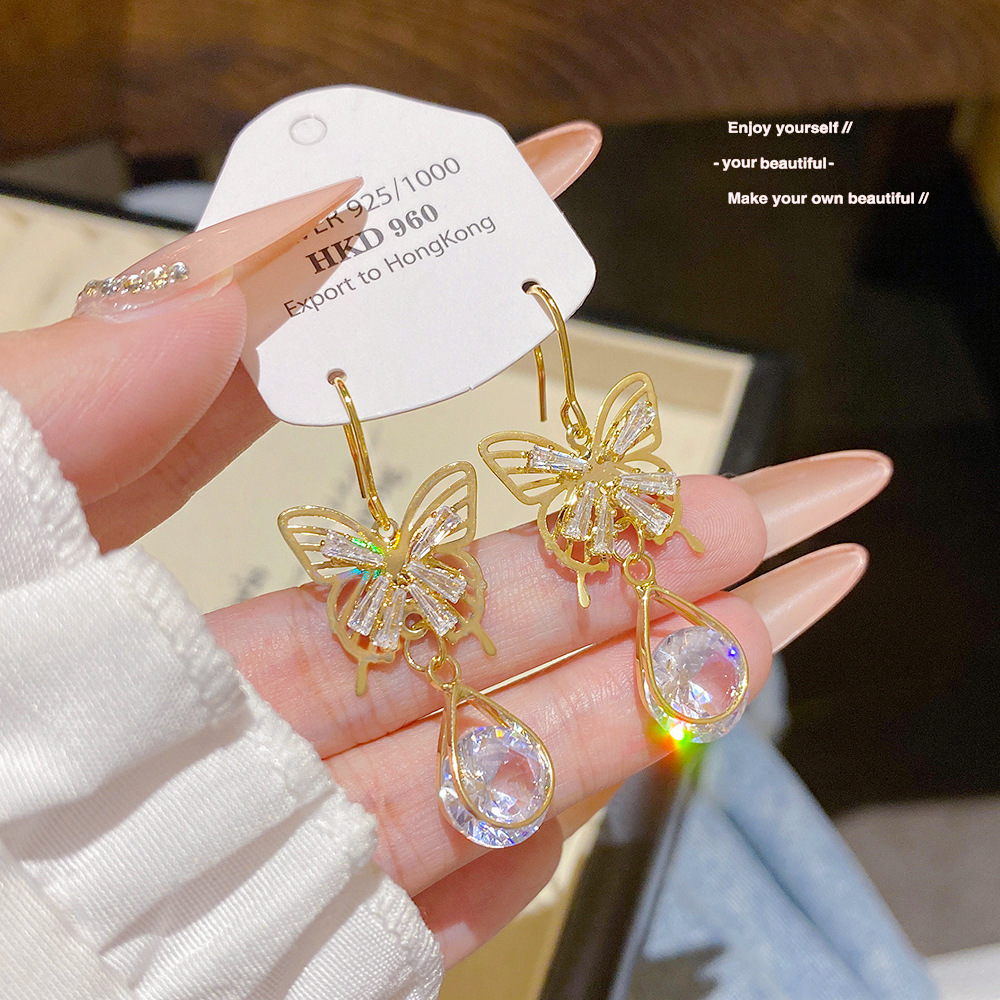 Fashionable elegant sophisticated earrings with zircon drop-shaped