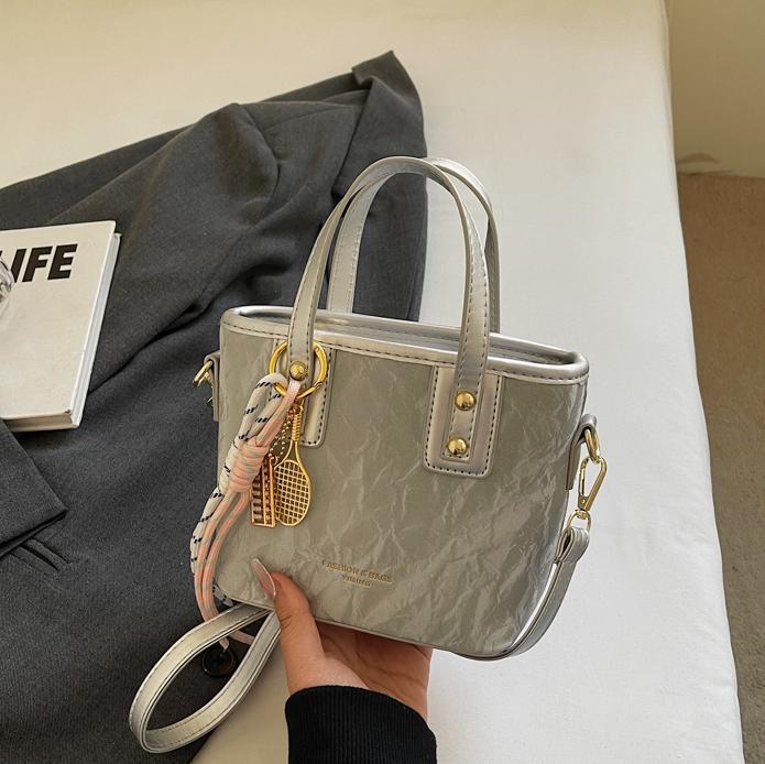 Comercio exterior explosión bolso de cubo de mano mujer 2025 nuevo simple bolso de hombro casual red explosión bolso de mochila coreano