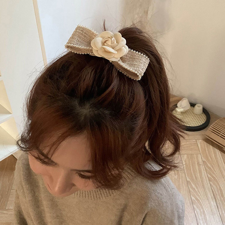 Tweed kamelia hårspänne för kvinnor i chanel stil med rosett_voghion.com
