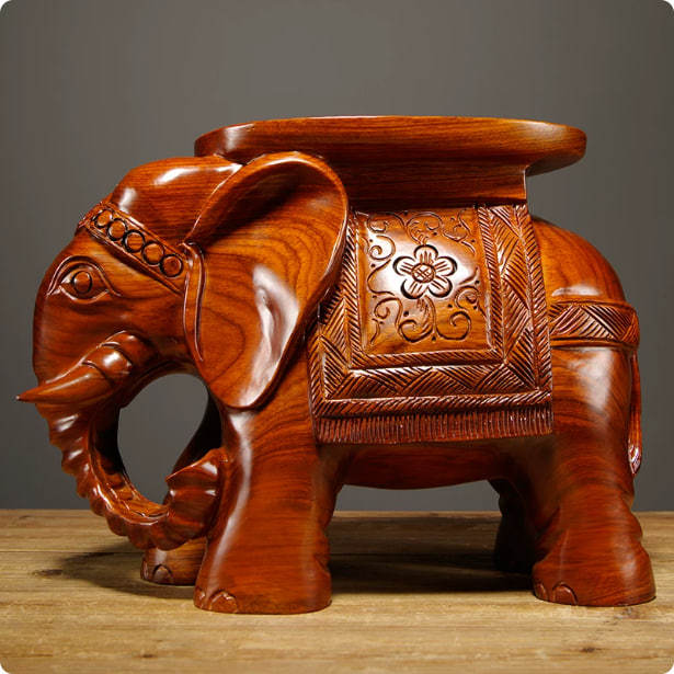 Rosewood carved elephant stool, a decorative piece for the living room, a shoe-changing stool for the entrance, a coffee table stool, and a decorative item for the foyer