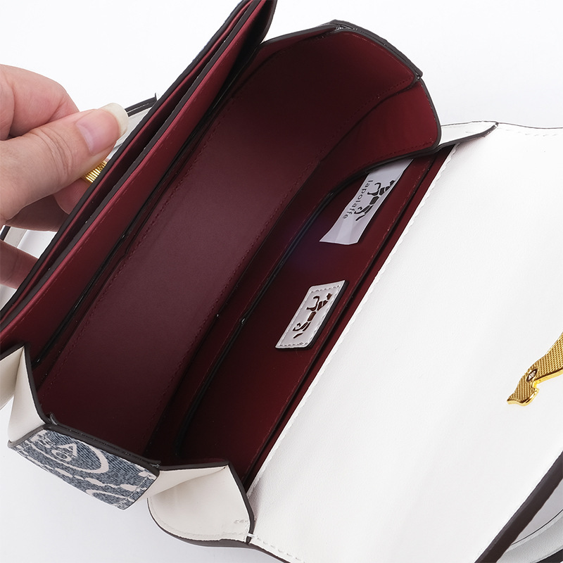 Mujeres de estilo pequeño Bao redondo con tapa de flip color contraste de alta sensación larga correa de hombro bolsas de torta 2025 nuevo LP7229 #