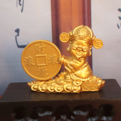 笑顔の財神が財源を飾っています。