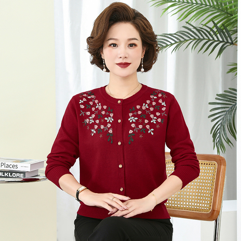 Thin knitted sweater with a round collar