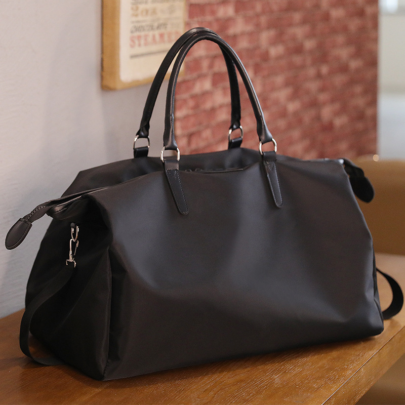 Bolsa de viaje portátil de gran capacidad Bolsa de equipaje de corta distancia para hombres Bolsa de viaje impermeable ligera Bolsa de hombro fitness crossbody para mujer