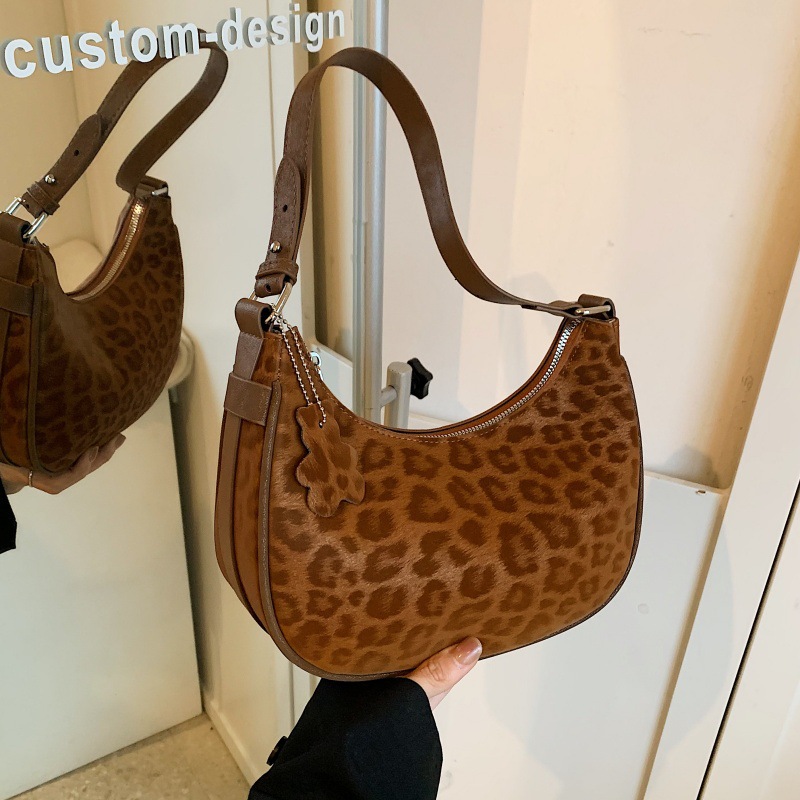 Bolso de mano transfronterizo de viento de cientos de siglos de verano 2025 nuevo retro leopardo bolso de hombro personalidad chica caliente bolso de moda
