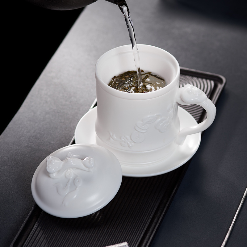 Porcelana color Mancheng Dehua porcelana blanca con tapa filtro oficina con revestimiento de separación taza de agua taza de té grande de cerámica personal