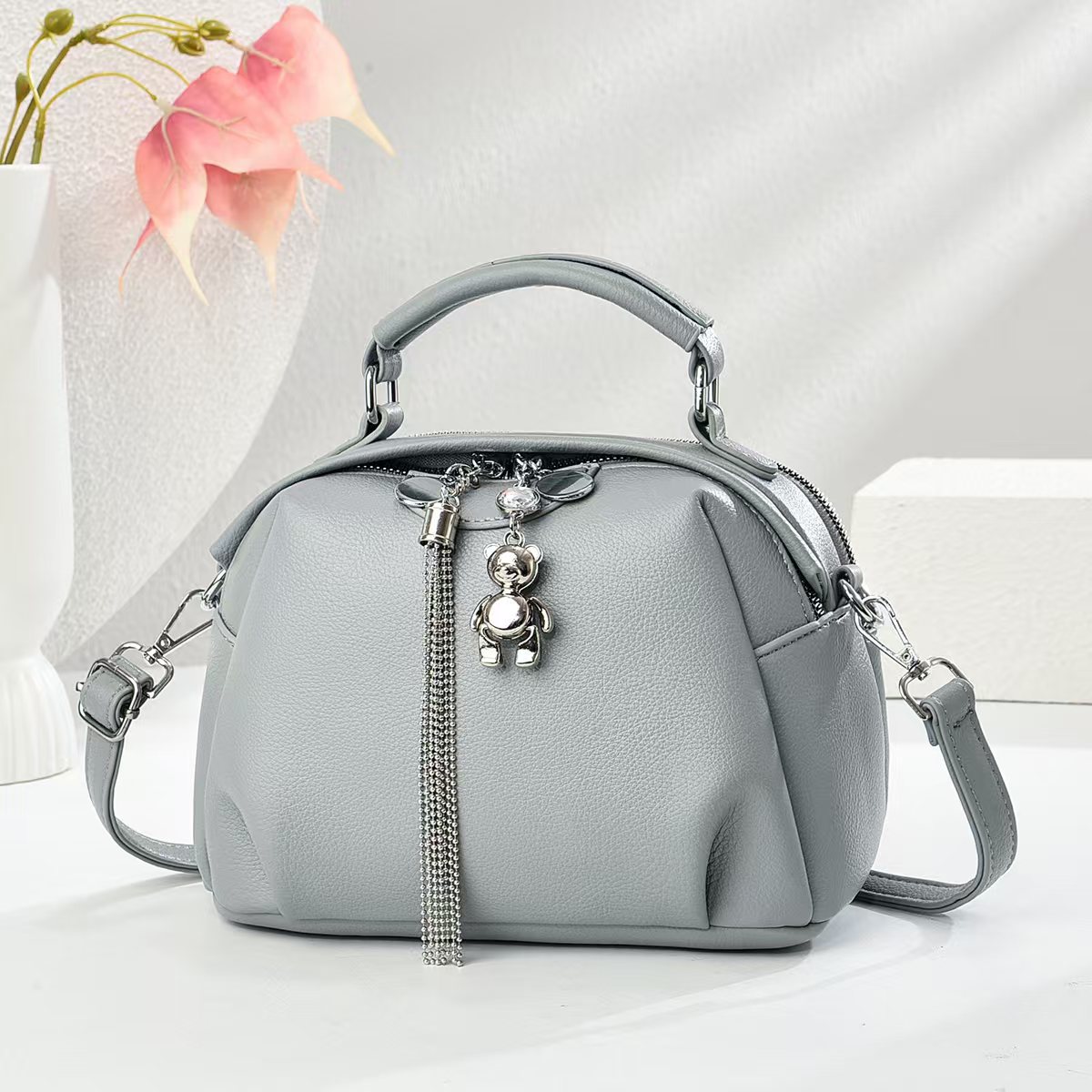 Patrón de lichi de cuero suave de moda salvaje 2025 nuevo bolso de viajero bolso de hombro de gran capacidad retro de verano