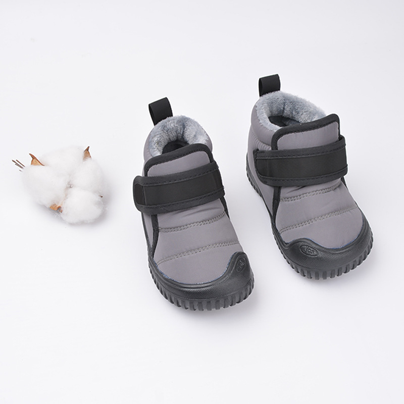 Zapatos de algodón para niños con forro polar de invierno Comercio exterior casual Fondo suave cálido botas de algodón para bebés de hombres y mujeres Velcro botas cortas para niños transfronterizas