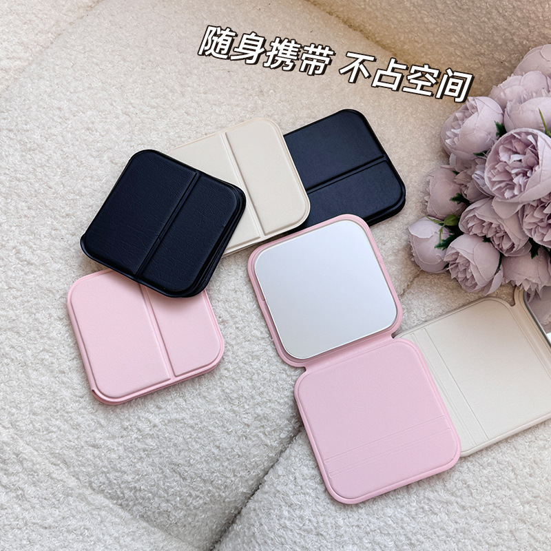 Espejo pequeño de escritorio de alto valor facial espejo de maquillaje plegable portátil dormitorio de estudiantes pequeño espejo cuadrado espejo doméstico unisex
