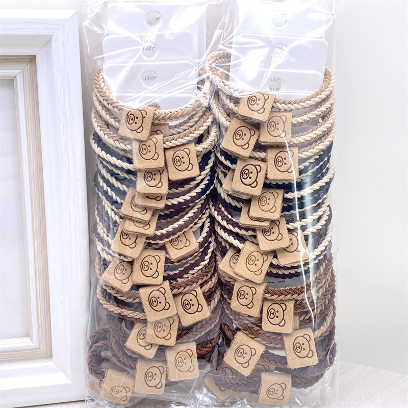 Descuento 4 tarjetas estilo coreano leche té color lindo paño etiqueta banda de pelo banda de goma de las mujeres del lazo del pelo cuerda de pelo 2 yuanes tienda accesorios