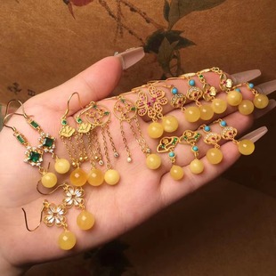 Natural beeswax earrings 925 silver inlaid chicken yellow amber beeswax earrings can pond factory wholesale direct sales
