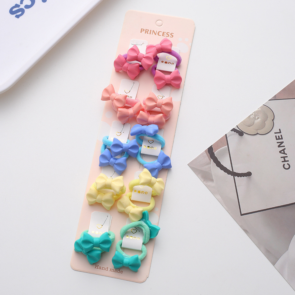 La alta elasticidad de los niños no duele la banda de goma de la cuerda del pelo del bebé de la banda linda del pelo del pulgar de la niña