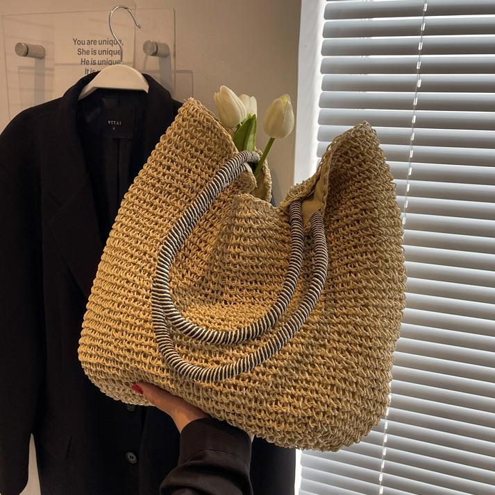 Bolsos de paja populares de verano para mujer 2025 nuevo bolso de tote hueco tejido más vendido bolso de mujer de viaje de gran capacidad