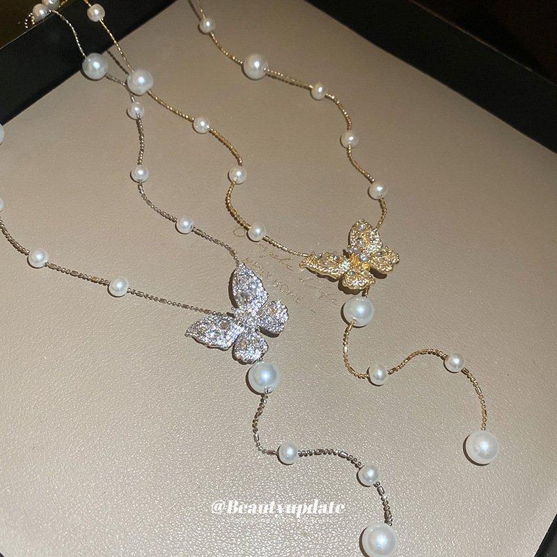 Galvanizado en oro real, circón, mariposa, perla, collar con borla, red, cadena de clavícula de viento rojo, súper hada, dulce, alta sensación, collar femenino