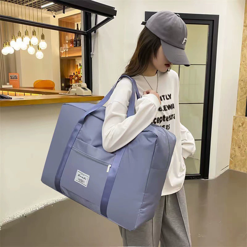 Capacious fashionable luggage travel bag to go out, worn on the shoulder