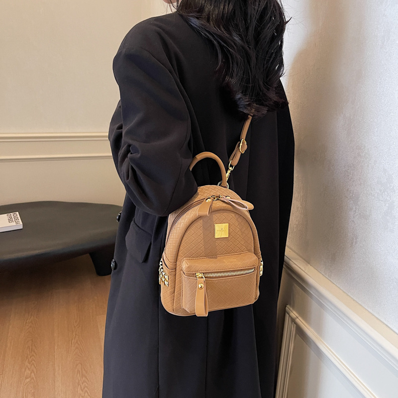 Mochila coreana de moda de estilo extranjero para mujeres simple color sólido bolso portátil de mujer 2025 nueva mochila de estudiantes de comercio exterior