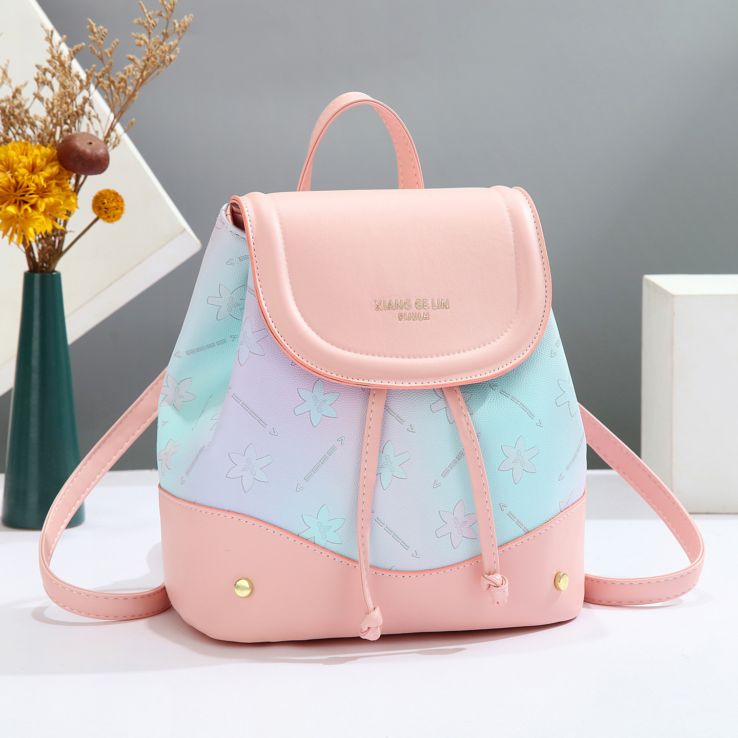 2025 nueva mochila de estilo universitario de moda de moda de impresión de moda de mujeres mochila de verano simple versátil mochila de estudiantes