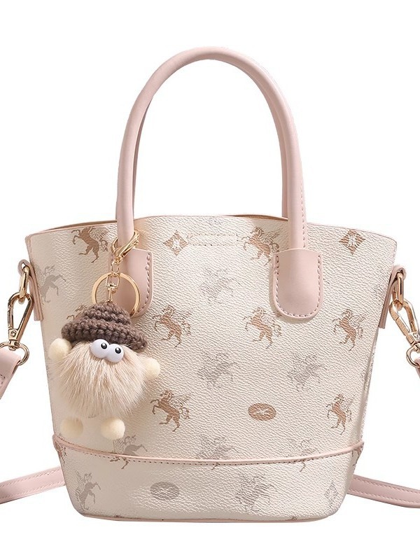 Bolsa de balde de mujer coreana in tide bolso de hombro de moda 2025 primavera y verano nuevo nicho simple bolso de mujer de alta calidad