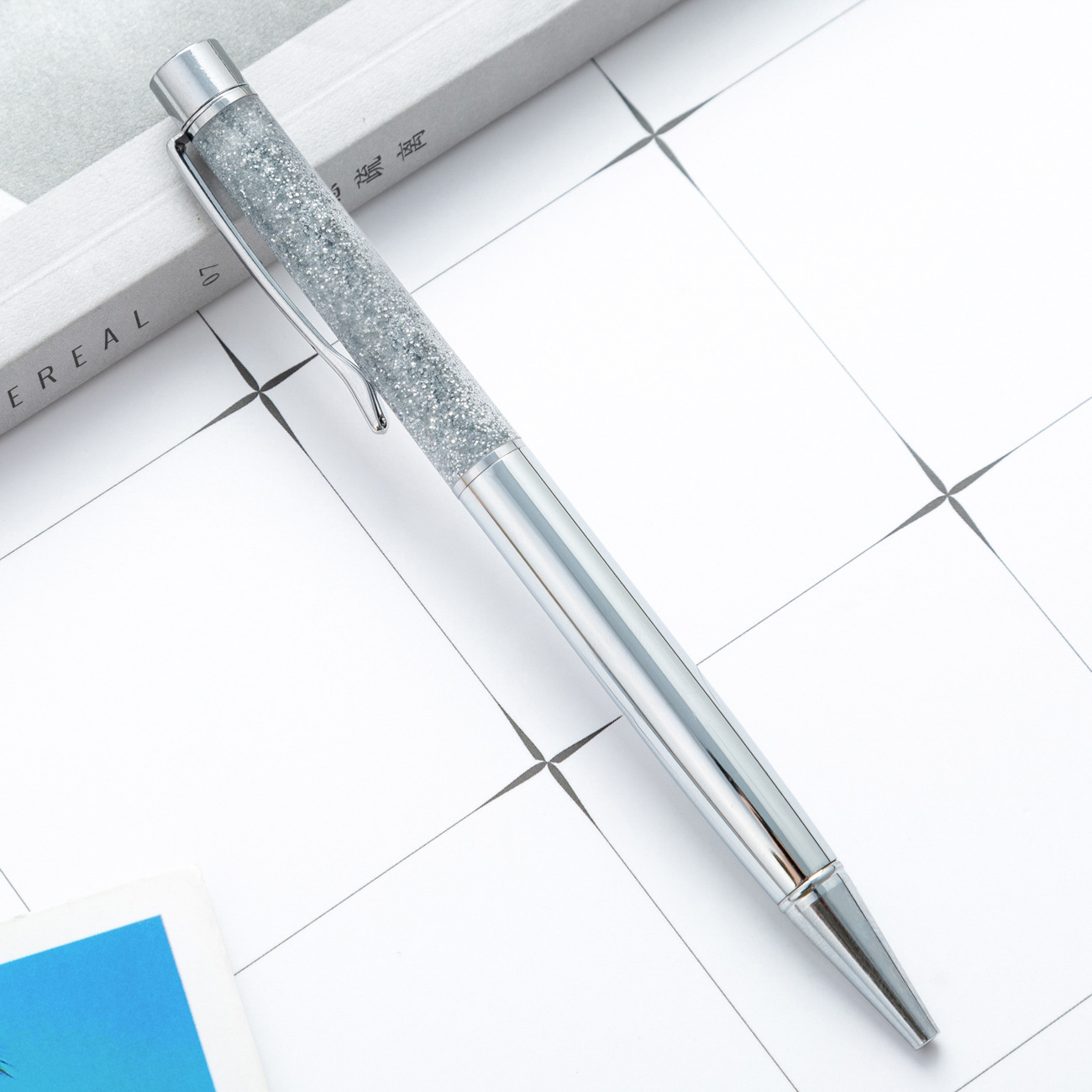 Creativo tiza de oro en aceite reloj de arena metal pluma de cristal de alto valor de cara de color caramelo pluma de bola de firma de chicas