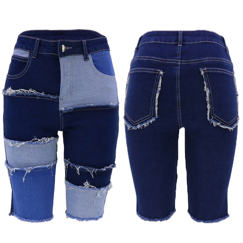 Comercio exterior nueva personalidad transfronteriza moda de cinco puntos Denim pantalones de mujer nuevos pantalones de patchwork de levantamiento de cadera elástica alta 2023 verano de mujer
