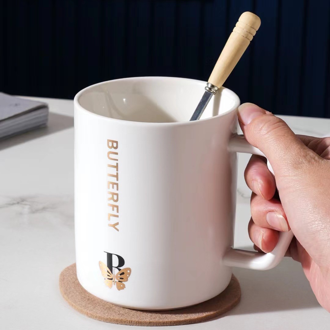 Creativo oro inglés regalo cerámica taza de agua con tapa cuchara Oficina taza café simple taza japonesa
