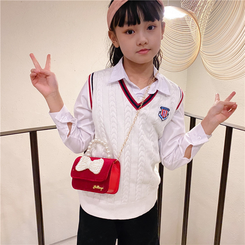 Mochila de niños estilo extranjero princesa perla de viento pequeño cambio bolso de hombro de niña encantadora