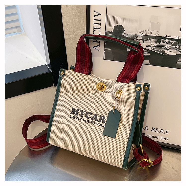 Bolsa de mano de lona de gran capacidad para mujeres 2024 nueva moda impresa letras mochilas bolsa de viaje casual