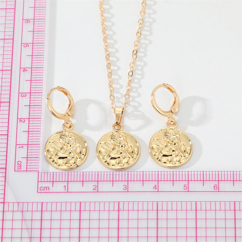 Fashion Golden Round Coin Embossed Angel Earring Necklace Set display picture 1