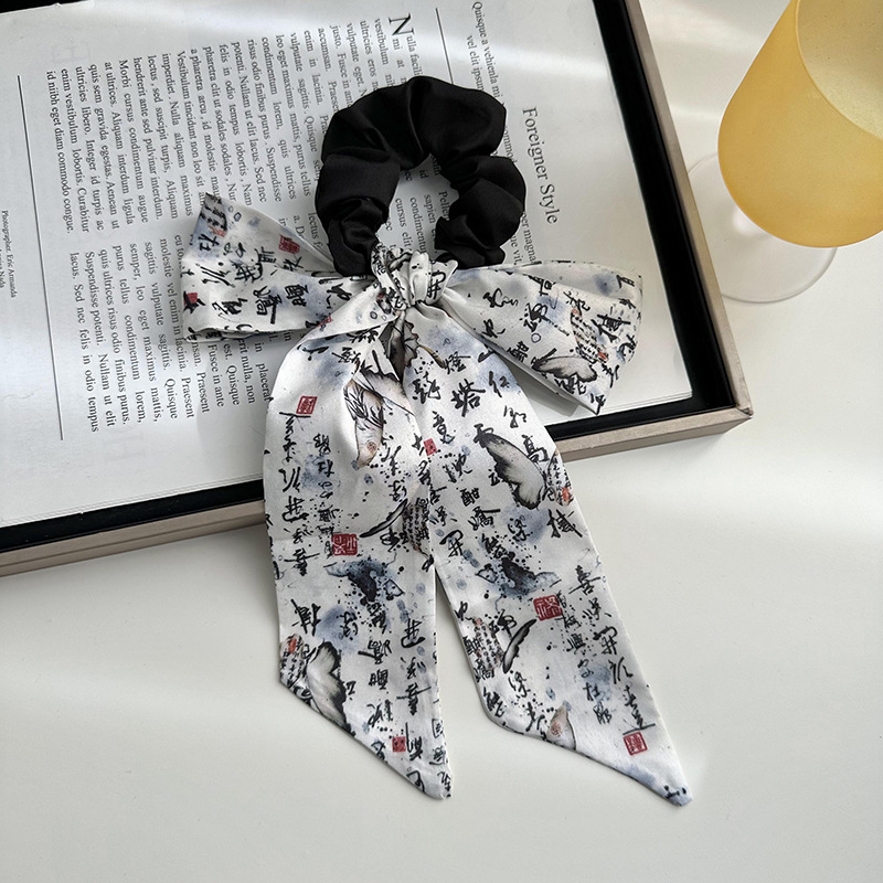 Anillo de cabello de arco femenino retro elegante correa francesa temperamento de alta sensación de impresión de anillo de intestino suave tocado versátil