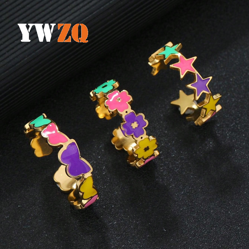Joyas de acero inoxidable transfronterizas frescas gotas de aceite de color estrella de pentaco flores mariposa dopamina abierta anillo de acero de titanio