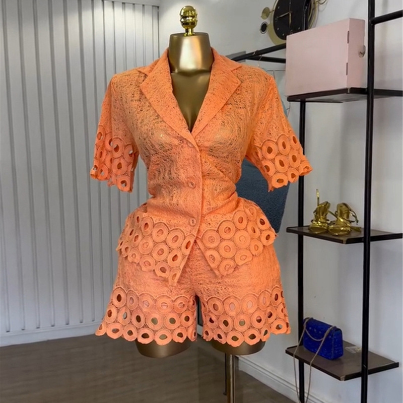 ヨーロッパとアメリカのクロスボーダー婦人服 2025 夏の新ファッションラペル中空半袖シャツワイドレッグショーツカジュアルスーツ|undefined