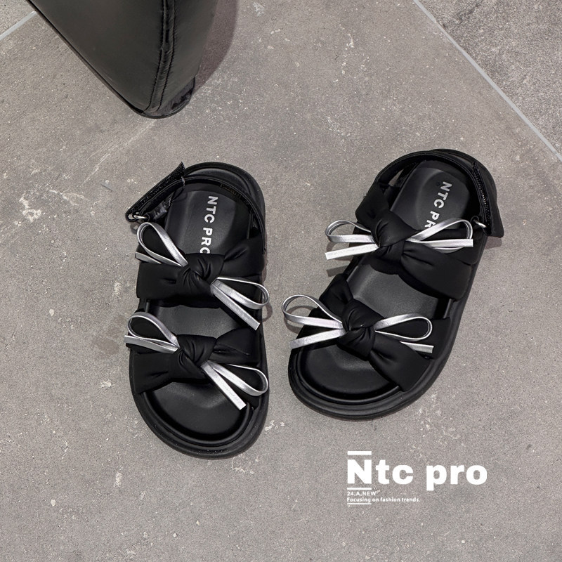 Sandalias de niñas 2026 primavera y otoño nuevos zapatos de princesa de niños zapatillas de arco de niños grandes zapatillas de niñas zapatos romanos suaves