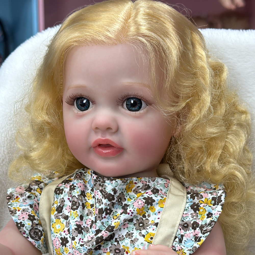 Regalos pesados de cabello largo transfronterizo bebé muñeca de lavado de agua muñeca calmante simulación de vacaciones cambiarse de niña