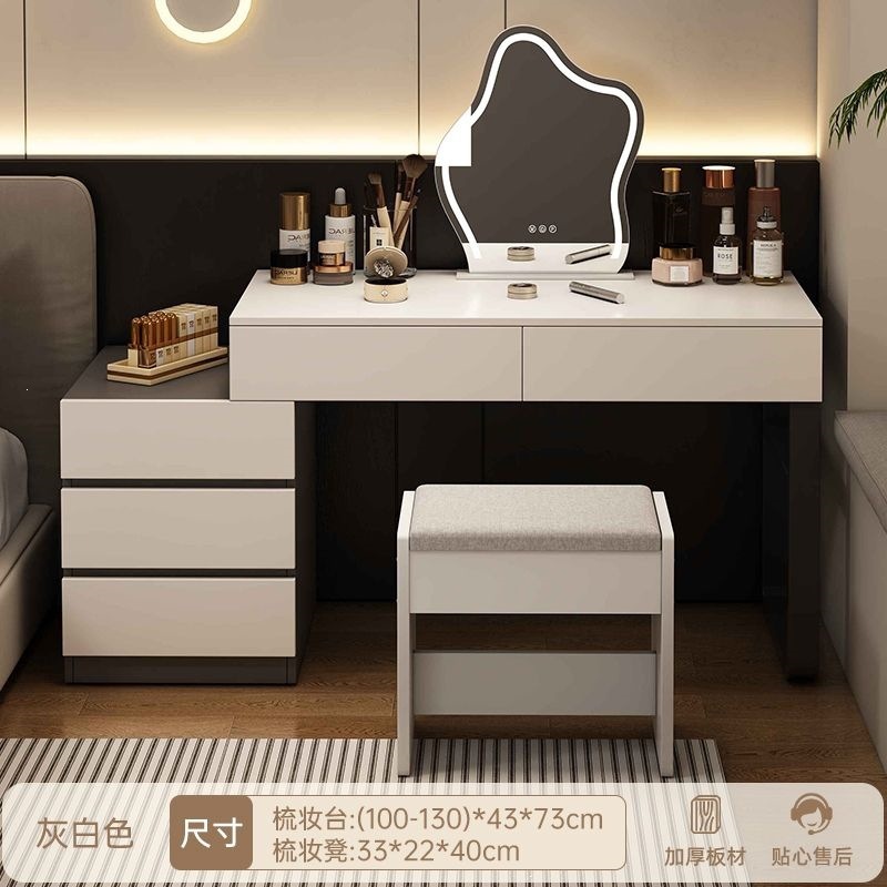Wardrobe de madera maciza de tabla de roca dormitorio moderno simple pequeño tipo de lujo ligero de alta sensación armario de maquillaje en casa