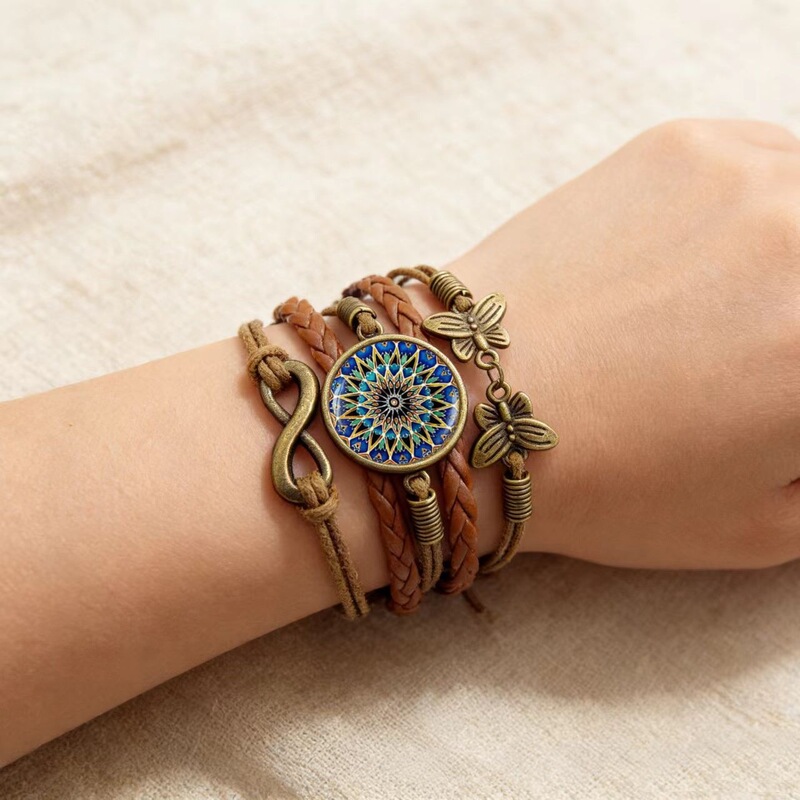 Vintage Multi-Layered Woven Bracelet with Butterfly and Infinity Symbols, Handmade Woven Bracelet with Yoga Mandala Flower Design Vintage Multi-Layered Woven Bracelet with Butterfly and Infinity Symbols, Handmade Woven Bracelet with Yoga Mandala Flower Design