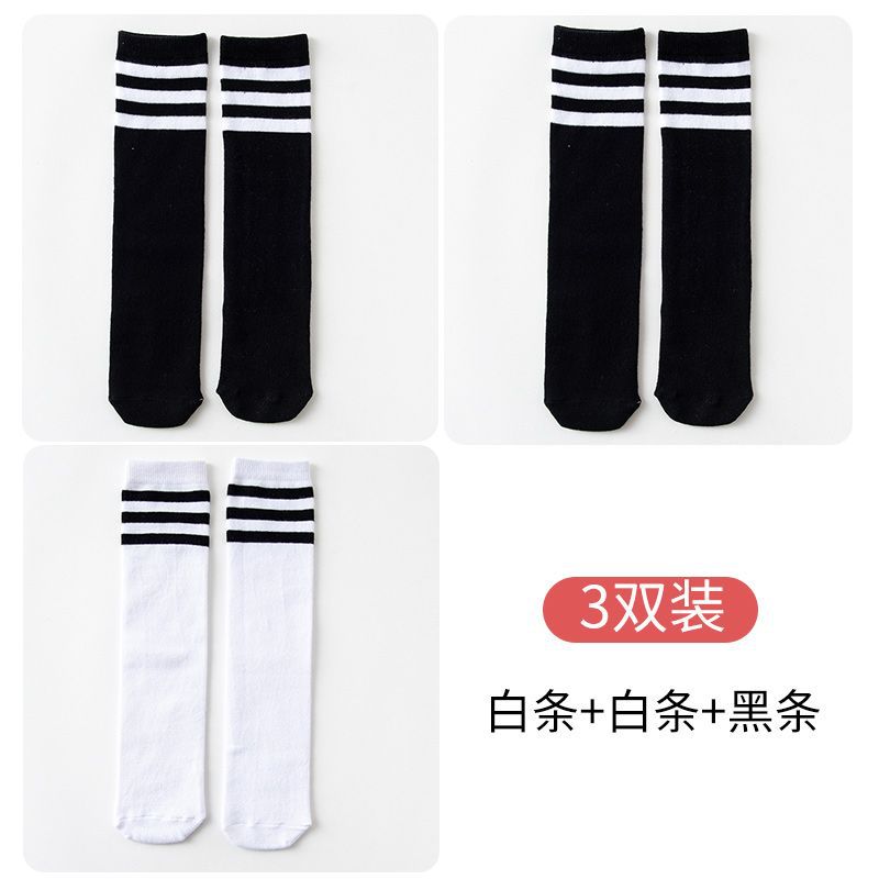 White stripes on black background + white stripes on black background + black stripes on white background