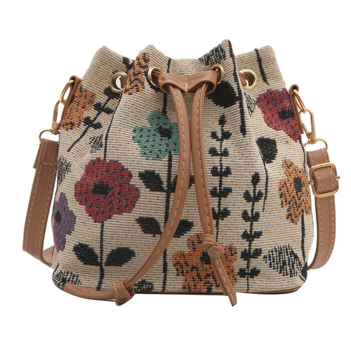Cross-border popular women's 2025 new stylish ethnic Feng Shui bucket bag, versatile texture commuting shoulder and cross-body bag
