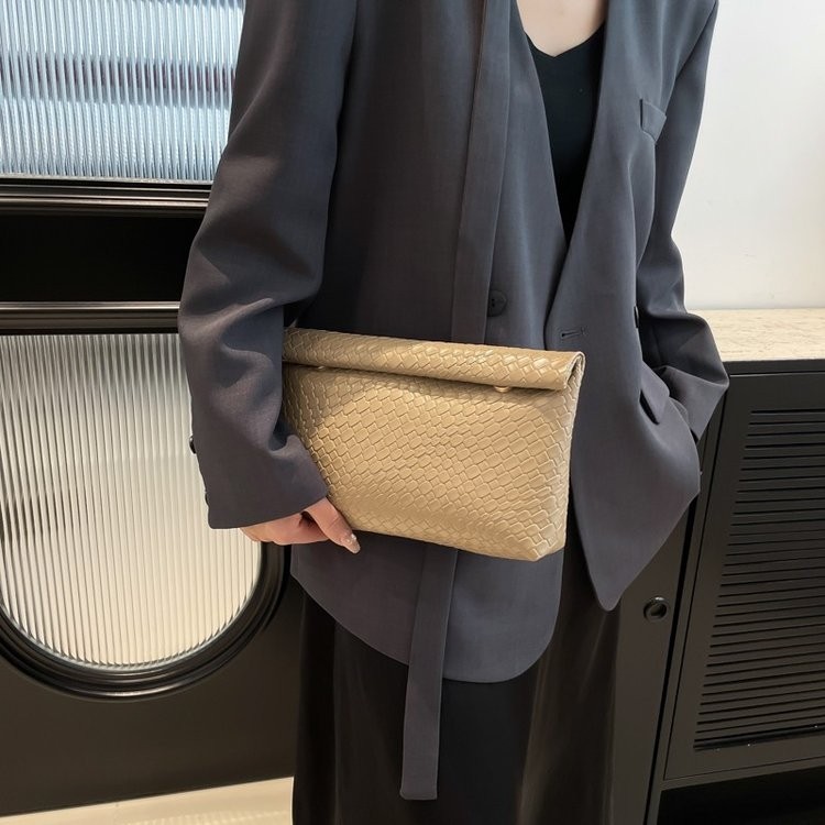 Bolsa de mano casual universal transfronteriza para mujeres nueva moda coreana simple bolsa de almohada de viaje