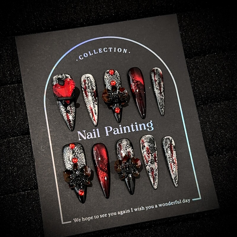 Handmade Halloween-themed nail art: dark, wine-red cat-eye nail stickers in a European and American gothic style Handmade Halloween-themed nail art: dark, wine-red cat-eye nail stickers in a European and American gothic style