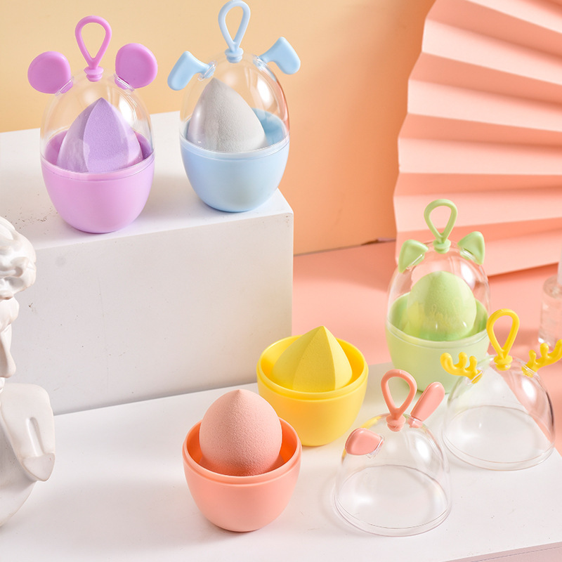 Linda mascota belleza huevo sin polvo maquillaje huevo en polvo puff traje gota de agua calabaza corte oblicuo maquillaje esponja al por mayor maquillaje huevo