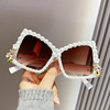 Sunglasses from pearl, fashionable glasses with bow, European style