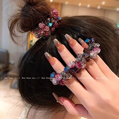 ハイエンドの紫赤色の頭の花の水晶は輪の女性の馬尾の頭の縄の2025の新型のお団子の頭が髪の毛の筋を刺して髪を飾ります。