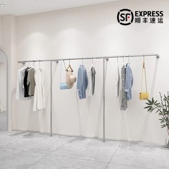 洋服店の展示棚はステンレスの壁の壁掛け棚を厚くして、女装の子供服店は簡単に陳列してハンガーを掛けます。