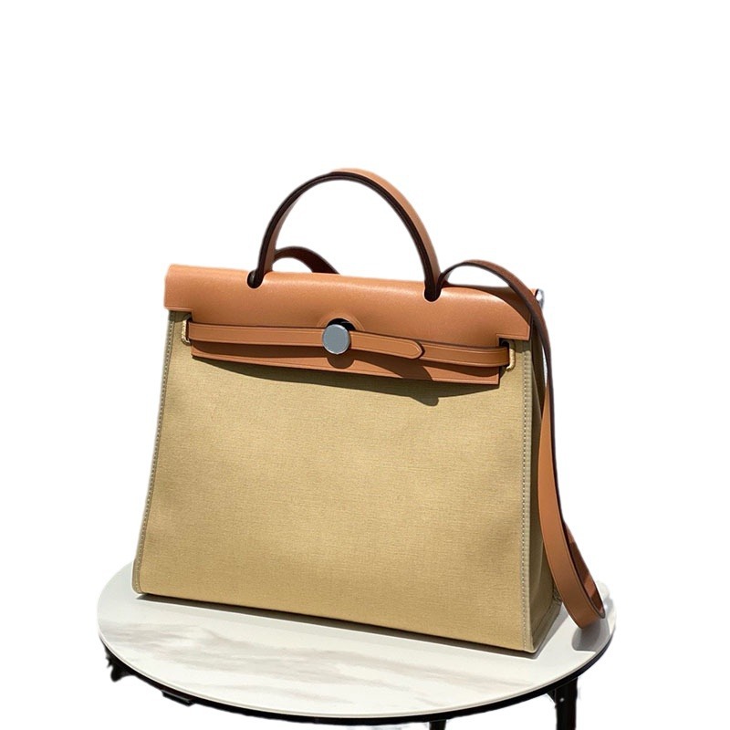 手作りherbag外縫い本革キャリーバッグ色合わせキャンバス手提げシングルショルダー女性バッグ大容量通勤バッグ