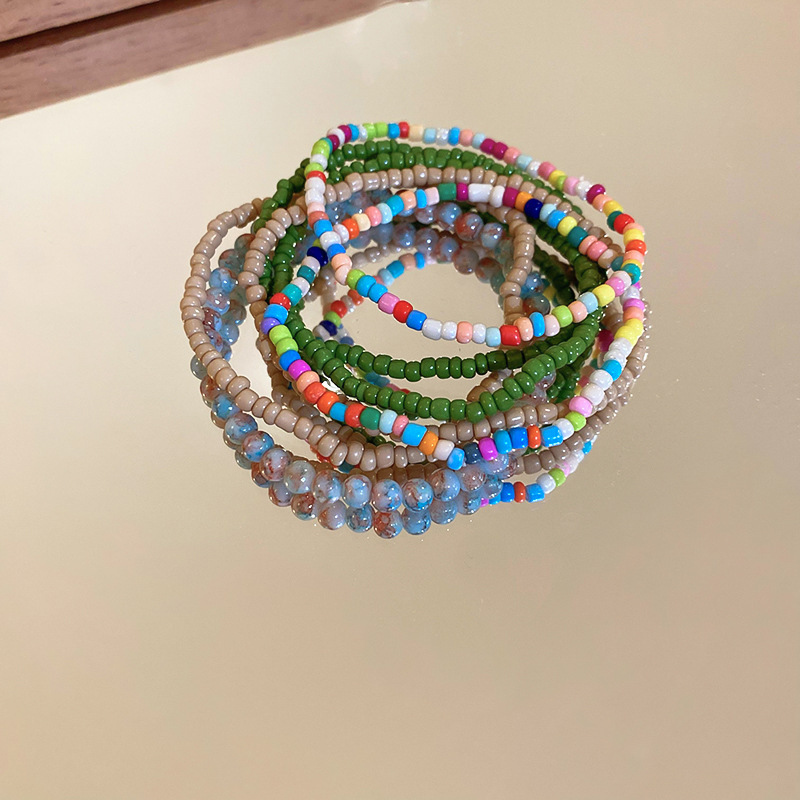 Pulsera de cuentas de arroz apilada de estilo bohemio, juego de siete piezas, pulsera de dopamina de alta calidad, joyería fresca de nicho al por mayor